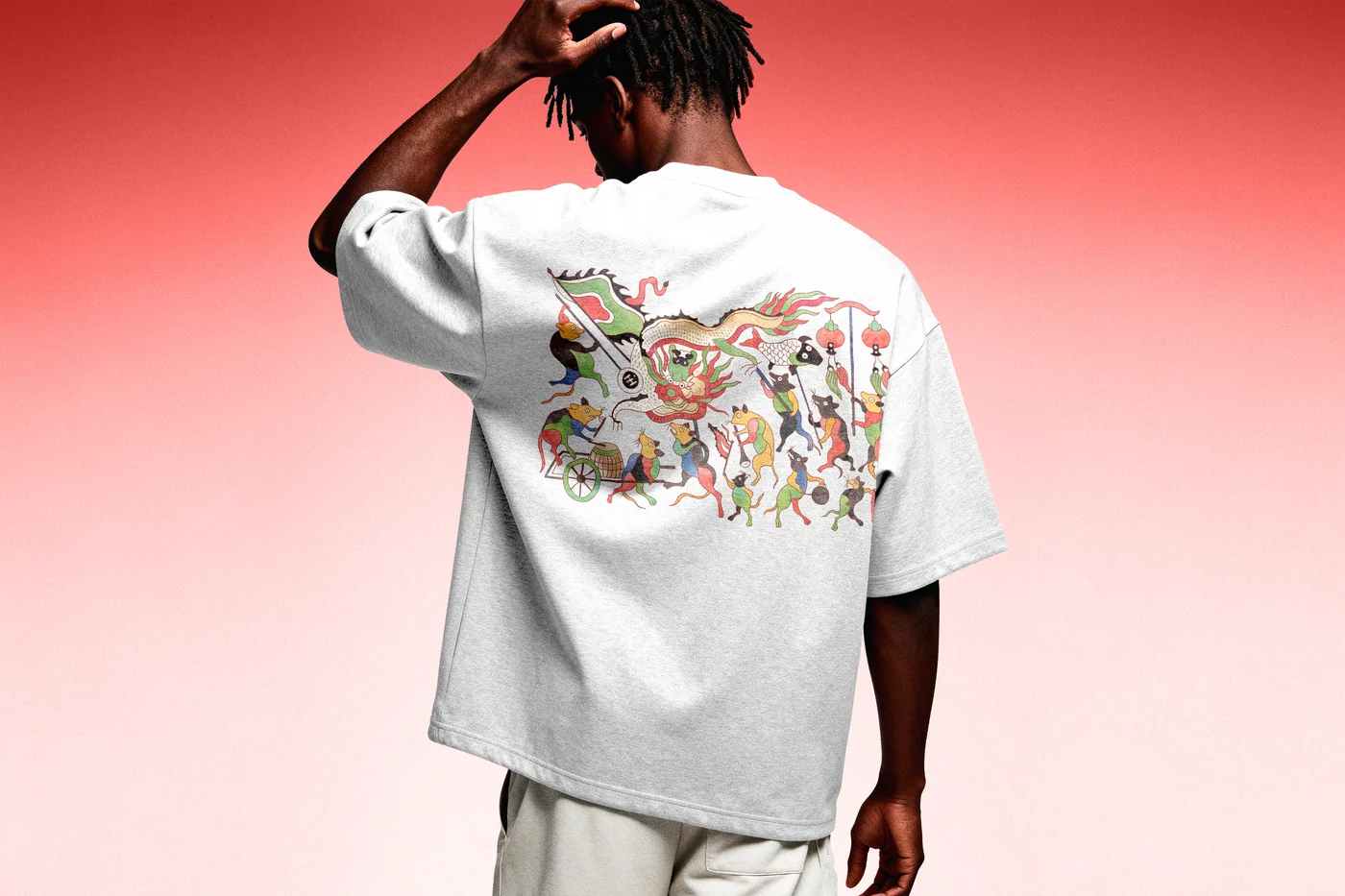Heavyweight boxy t-shirt back featuring Chuot Mua Rong multi-colour woodcut print