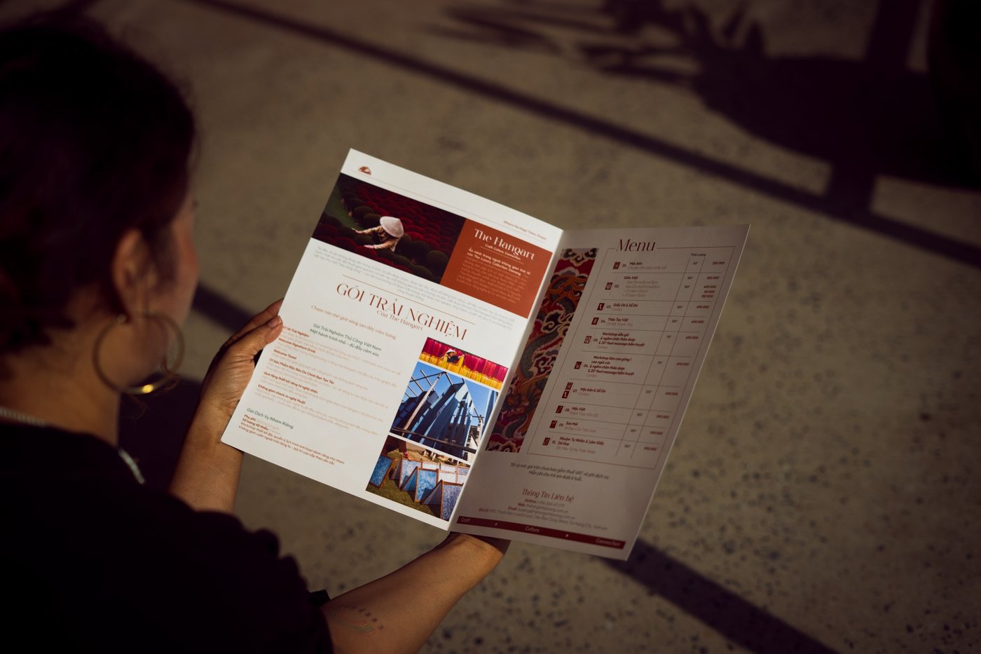 A guest reading the guide booklet