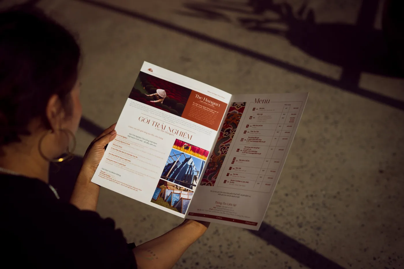 A guest reading the guide booklet