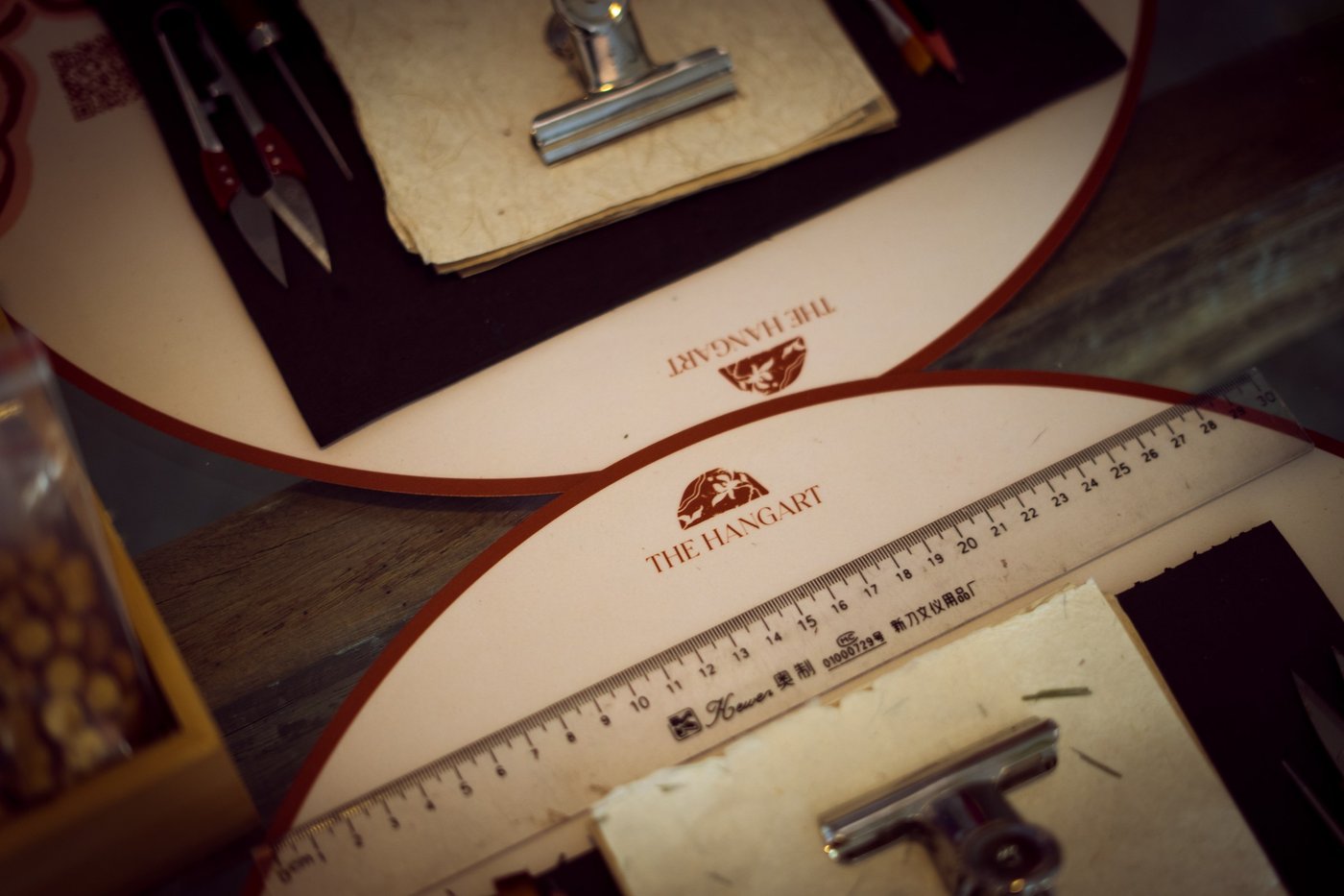 Branded deskmat with tools and ruler