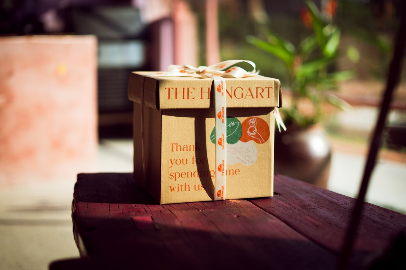 Gift box with ribbon and thank-you card