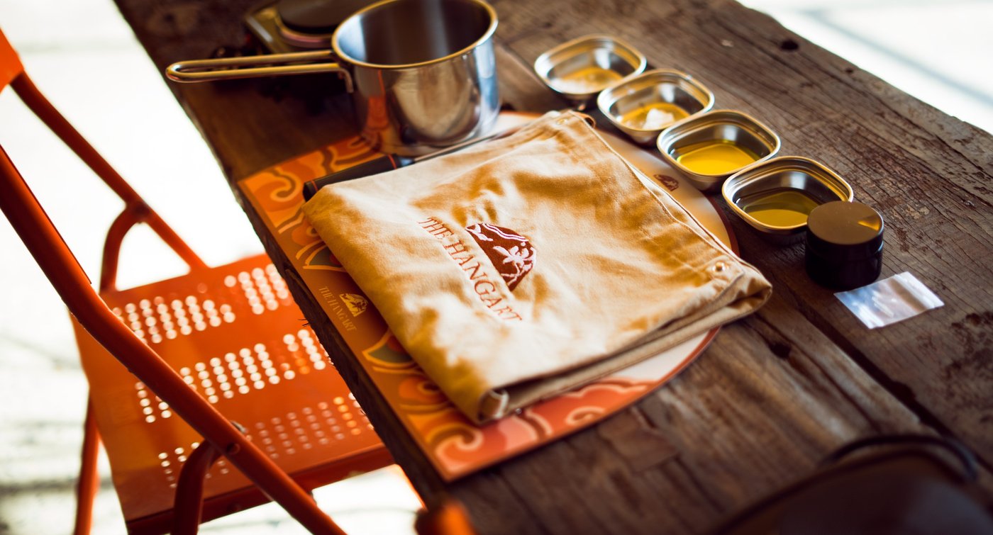 Embroidered pouch on a tray