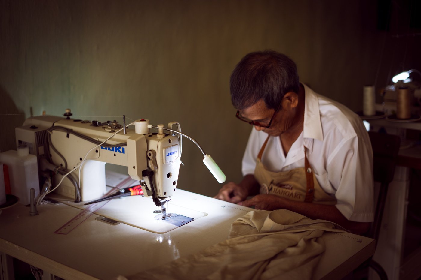 The tailor at his machine