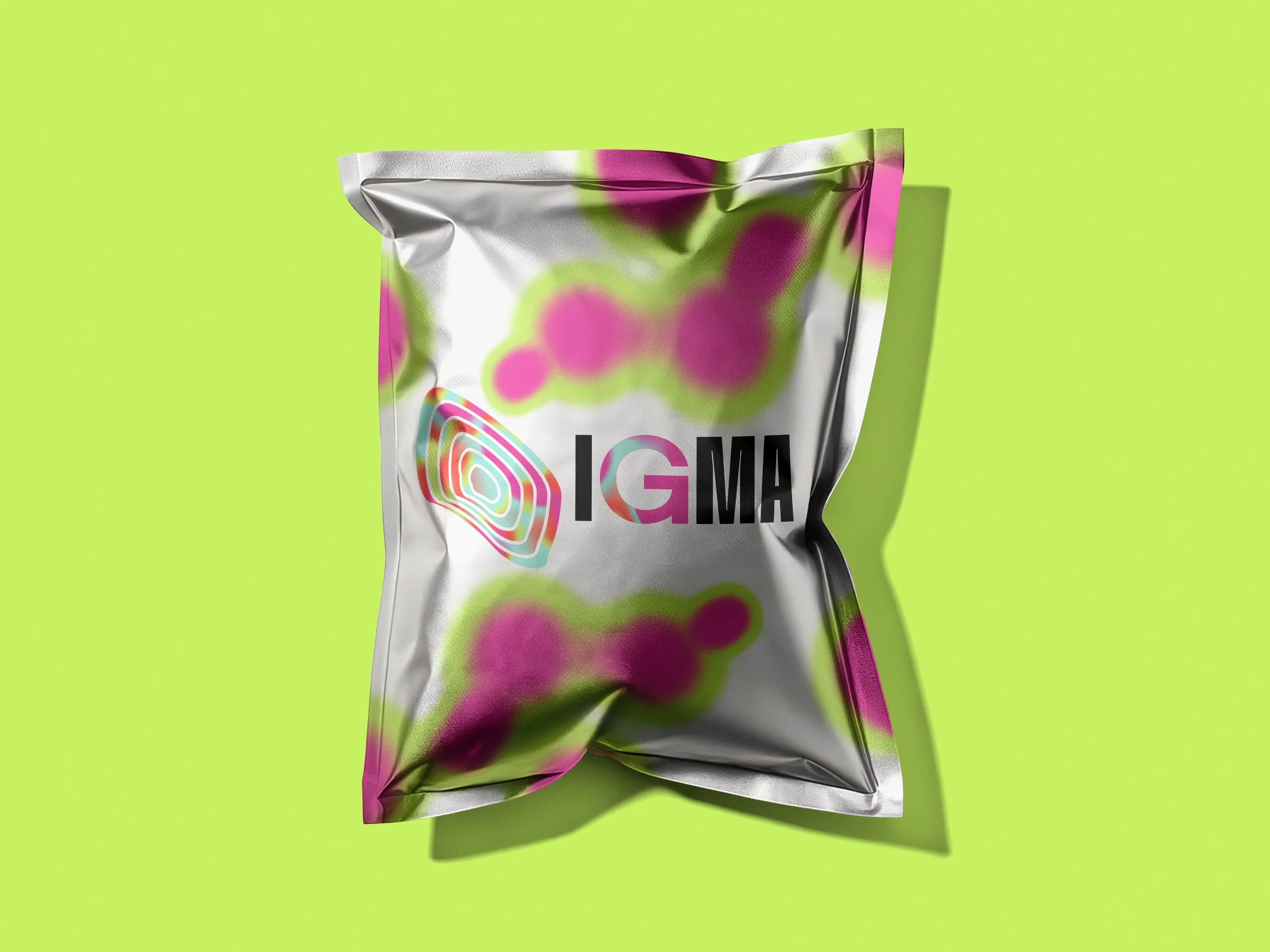 A foil pouch printed with the thermal gradient and the IGMA wordmark, on citric green.