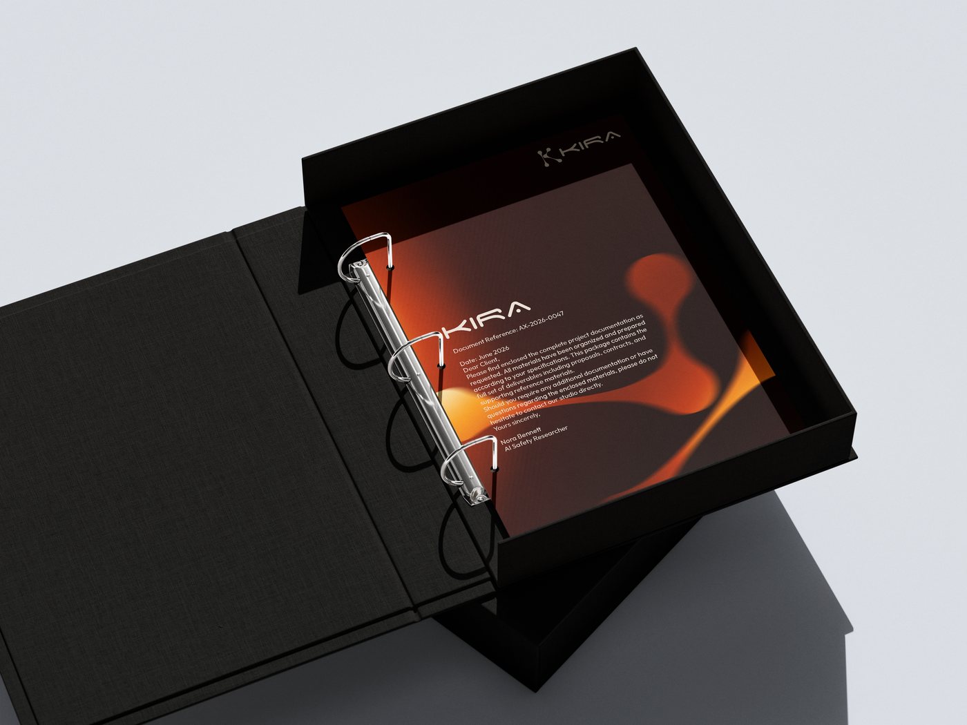 Kira press binder in a black archive box