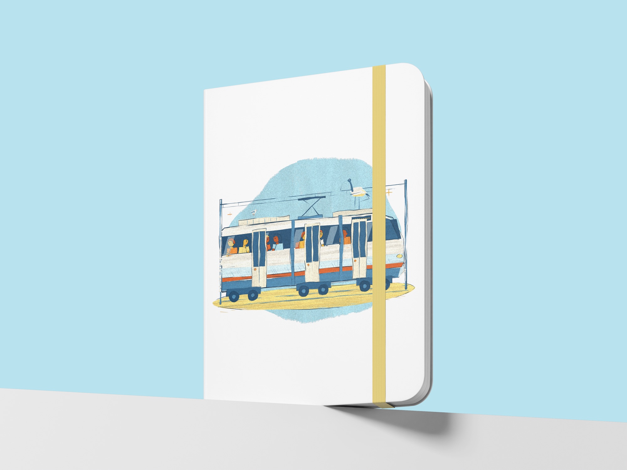 Hardcover notebook with the light rail painting and a yellow elastic band